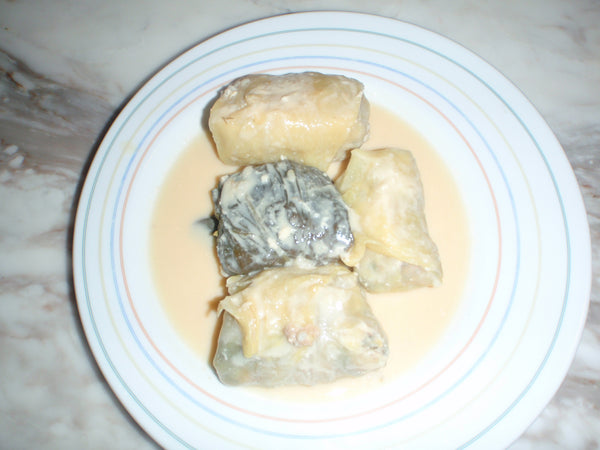 Stuffed cabbage rolls with egg-lemon sauce
