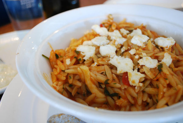 Giouvetsi: orzo baked in tomato sauce, topped with feta
