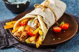 How many calories are in a souvlaki and how many in a Greek salad?
