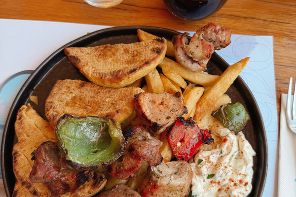 Greek souvlaki with tzatziki and roasted vegetables