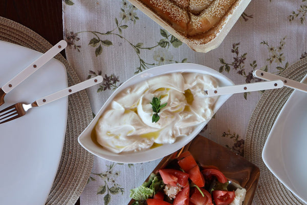 Greek meal with spinach pie, yogurt and salad